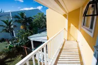 Modern Condo a few steps from sandy beach and resorts