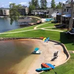 Top-Floor Lakefront Condo – Heated Pool, Boat Dock & Sunset Views