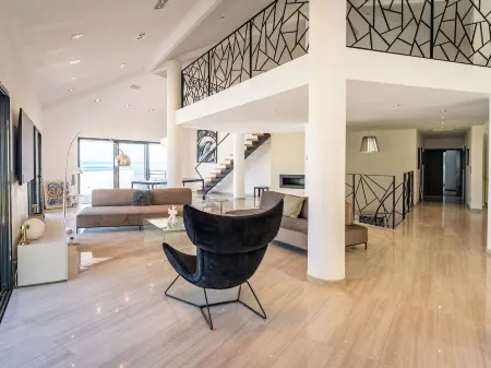 Architect-designed villa with panoramic view of the Revellata