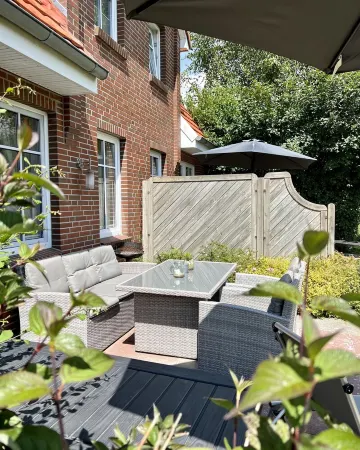 Lüttje Huck Ferienwohnung 4 - mit Sauna & Seeblick