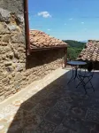 Tuscan Maremma: house in the medieval village of Roccatederighi. Hotels in Roccastrada