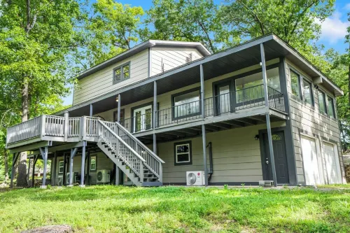 Spacious 4-bedroom Retreat on Table Rock Lake. Darts, Air Hockey, and More!