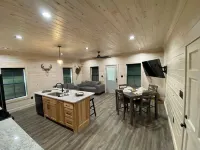 TAKE IT EASY Fishing Cabin. Large enclosed bay for storing the boat.