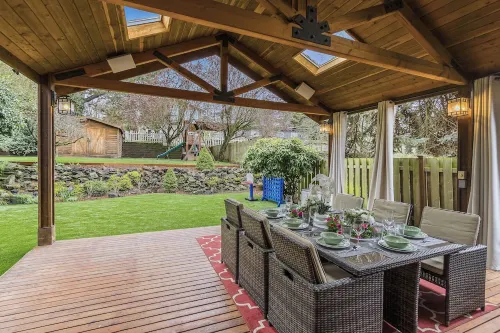 5-BDR w/ Rooftop Views, Covered Deck & Spacious Backyard–Prime Central Location!