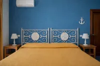 ホリデー ポンザ スコリエラ