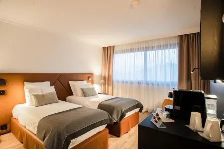 Appart'City Collection Genève Aéroport - Ferney Voltaire Отели в г. Превессен-Моэн