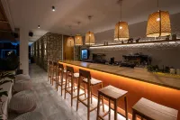 Kouros Exclusive Hotel & Suites - Adults Only - bar
