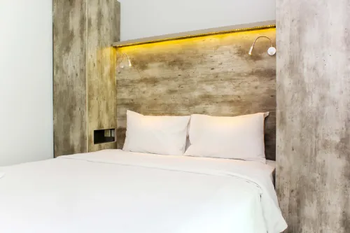 Cozy and Nice Studio at Grand Kamala Lagoon Apartment by Travelio