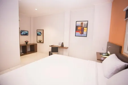 Hotel Bisnis Отели в г. Тимика