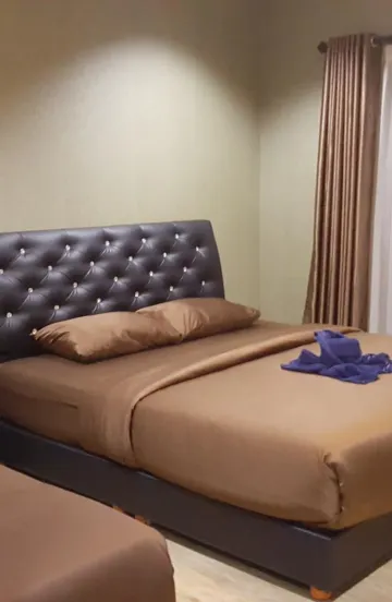 ห้องมาตรฐานพร้อมเตียงใหญ่และเตียงเดี่ยว