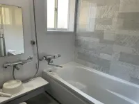 A House Surrounded by Mountains and the Sea on Sho