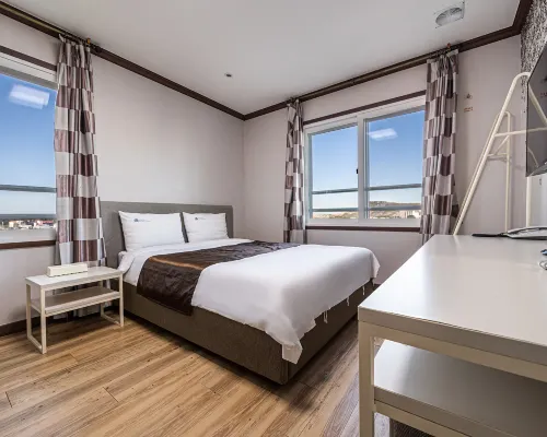 Seongsan Aqua Beach Hotel Отели рядом с достопримечательностью «Храм Понвонса»