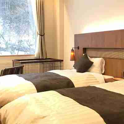 風木立の川辺 紫明館 Rooms