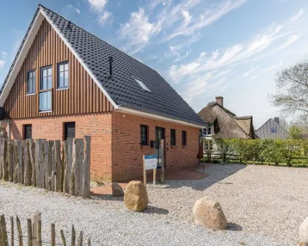 Seequartier - Nordsee Ferienhaus Tating Hotels in Tating