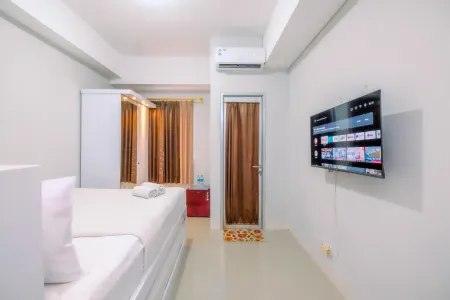 Minimalist Studio Transpark Juanda Bekasi Timur Apartment by Travelio