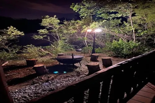 Big Mike's Cabin on the lake, next to ball diamonds nestled in 3 -cabin village