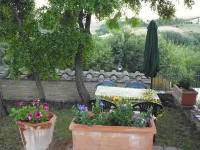 Casa di charme in a casolare di pietra con giardino privato