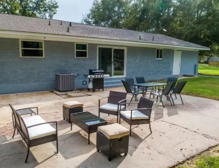 Heron's Cove Lake House with dock and kayaks