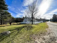Rocky Branch Retreat on 33 acres with fenced yard, fireplaces & deck