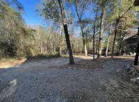 Creek-side getaway, big deck, easy access to the city while being off the grid!