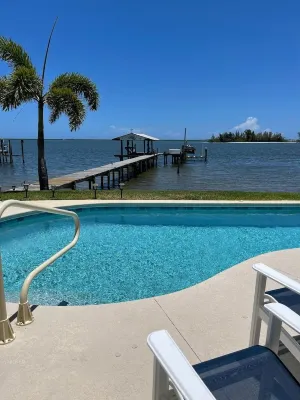 Waterfront Studio with pool and boat dock