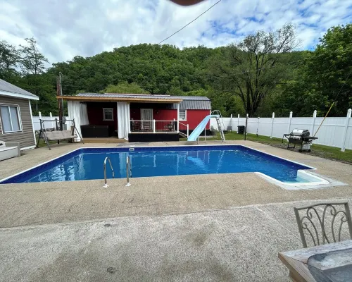 River Road Retreat.  Cabin minutes away from trails w/ hottub & seasonal pool! Hotels in Pike County