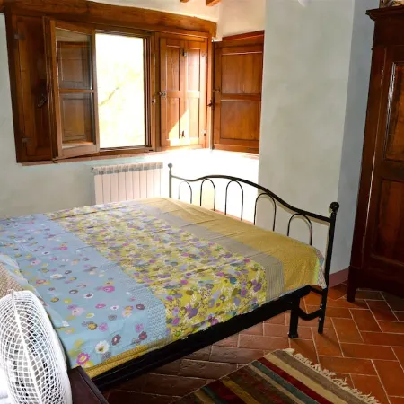 Casa di charme in a casolare di pietra con giardino privato