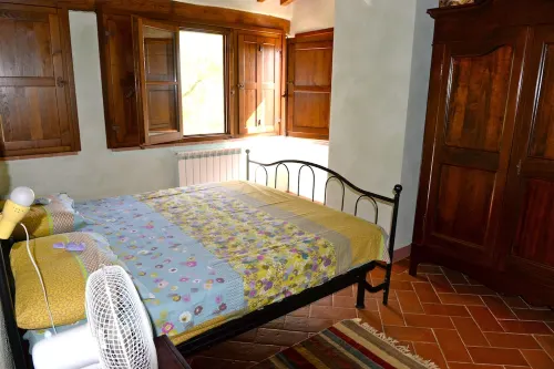 Casa di charme in a casolare di pietra con giardino privato