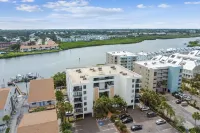 Waterfront views - steps from the Beach!