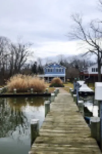 Waterfront Oasis w/ Private Dock, Firepit, Arcade & Sunset Views
