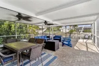 Casa di Amici – Saltwater Pool and Canal Home near AMI & much more!