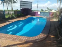 Reef Gardens Motel Hoteles en Proserpine