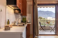 Amalia's Serendipity - City Lights & Mountain Vistas