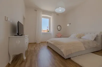 Captain Emo City Apartments Hotels near Temple of Augustus