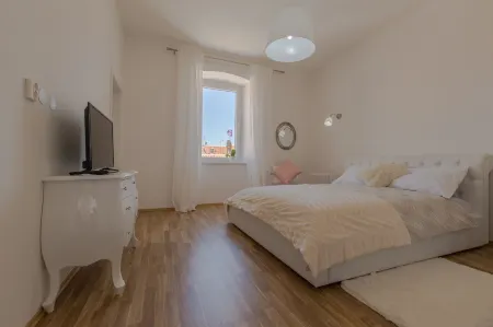 Captain Emo City Apartments Отели в г. Валтура