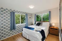 Hot Tub / Home Theater / Private Acre / Walk to Beach / Family and Dog Friendly