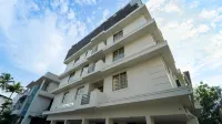 Treebo Petals Suites Hotels near Amrita Hospital, Kochi
