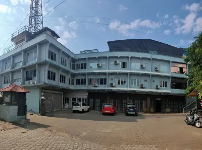 Kalyan Tourist Home Hotels near Kadampazhipuram Mosque