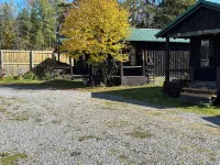 Classic original cedar log cabins set on Simms Stream in the North East Kingdom.