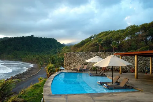 Pagua Bay House Oceanfront Cabanas Hotels in Calibishie