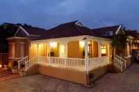 McAllisters on 8th Hotels near MAZISI KUNENE FOUNDATION