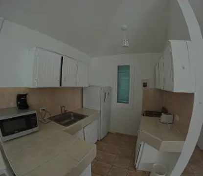 Condo with balcony and 2 beds in the heart of Sosua Отели рядом с достопримечательностью «Плайя Алисия»