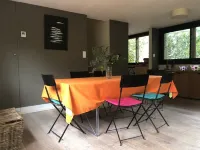 Wooden house in the golf, between forest, lake and ocean