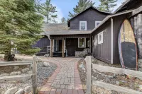 Amazing, sleeps 26, covered lakeside, bar, beach, Big St Germain Lake