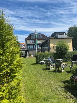 Dreamlike apartment house on the lakeshore port side