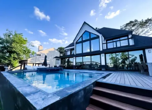 Spacious Luxury Lakefront Home with Pool and Jacuzzi, Firepit, and Game Room!