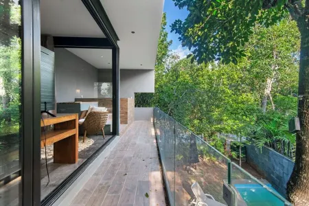 Charming 4-bedroom Villa with AC and WiFi and 2 Pools in Aldea Zama, Tulum