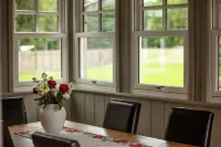 Landhaus hinter'm See vacation apartment Landliebe luxurious winter garden tiled stoves Uecker-Randow 호텔