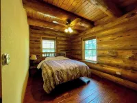 Custom log cabin tucked away in private forest
