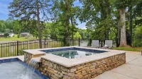 Poolside Paradise by Avantstay Waterfront Home + Pool + Spa Dock + Game Room Near Hiking - balcony